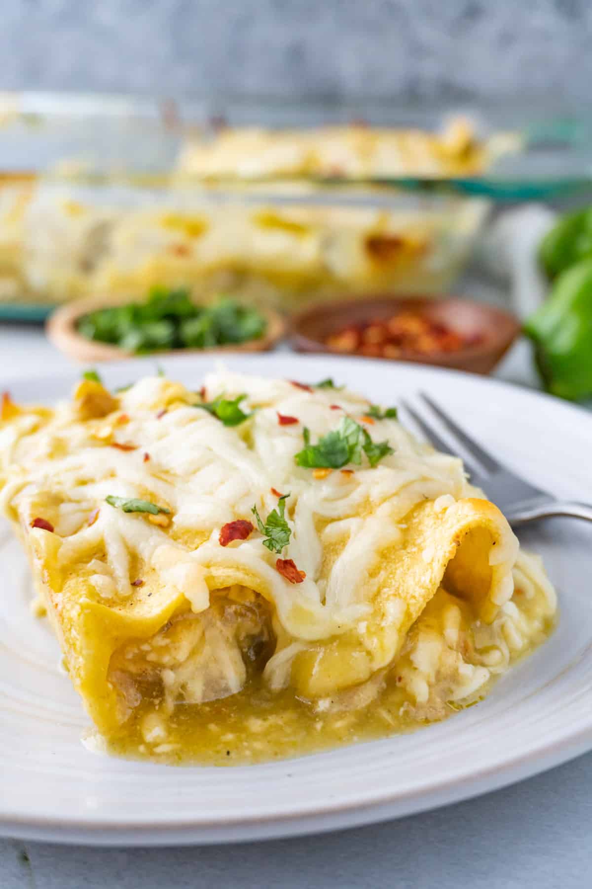 green chile chicken enchiladas close up