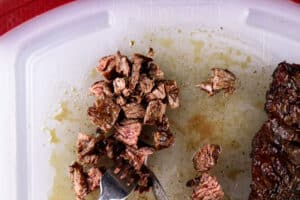 cutting steak into small pieces