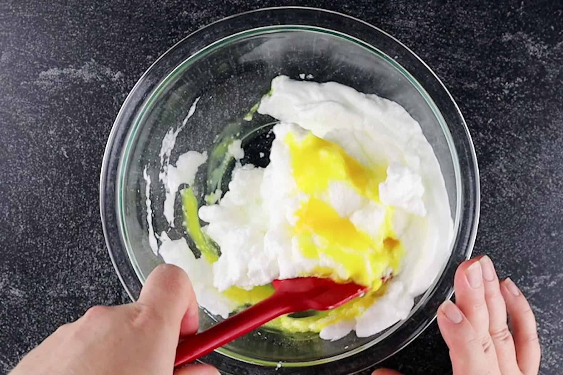 folding in egg yolks to egg whites