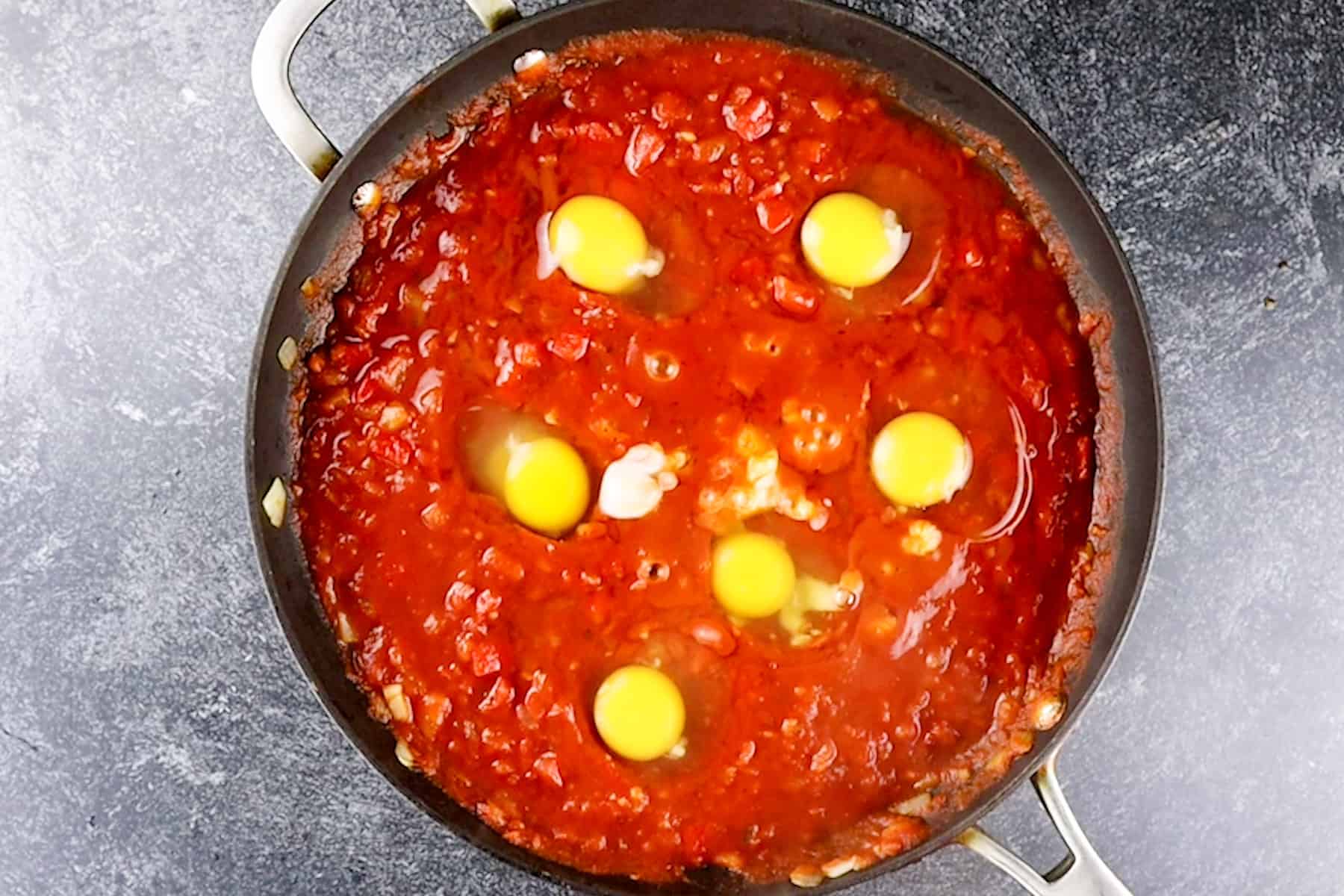 eggs in dish before being cooked