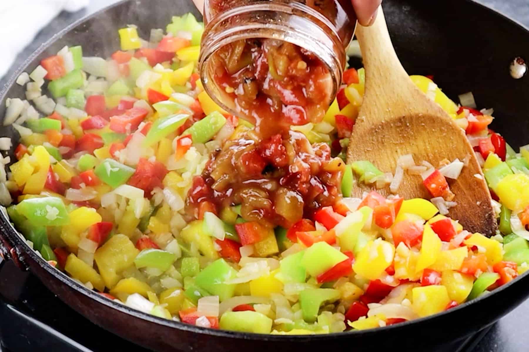 adding salsa to skillet