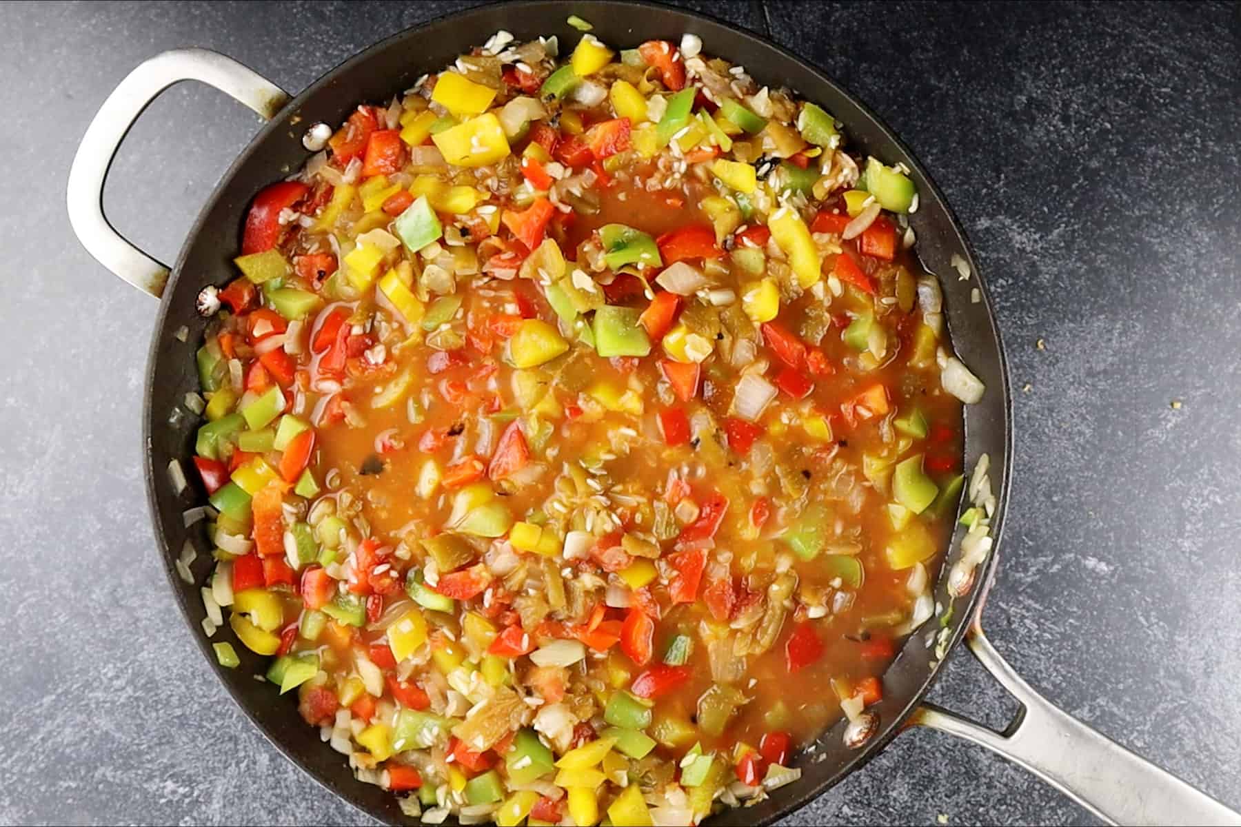 skillet with liquid simmering