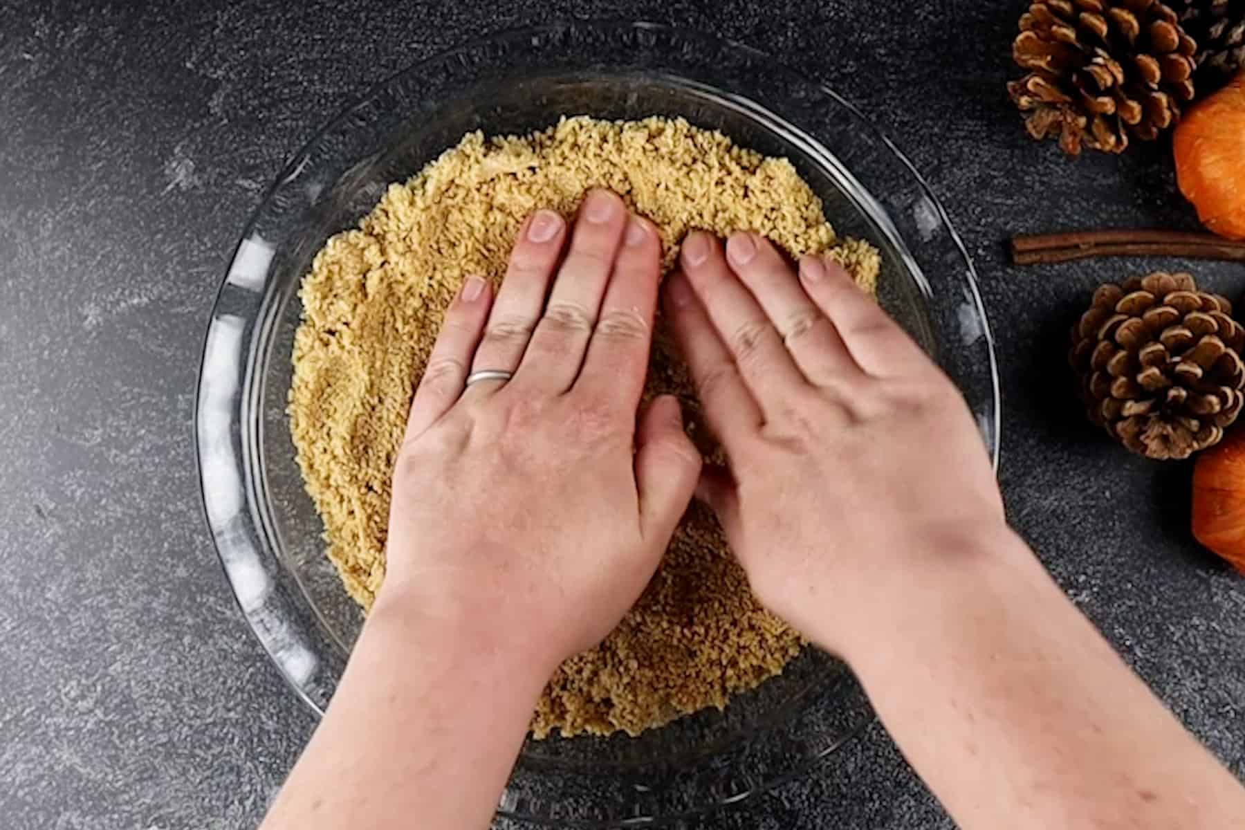 pressing in the graham cracker crust