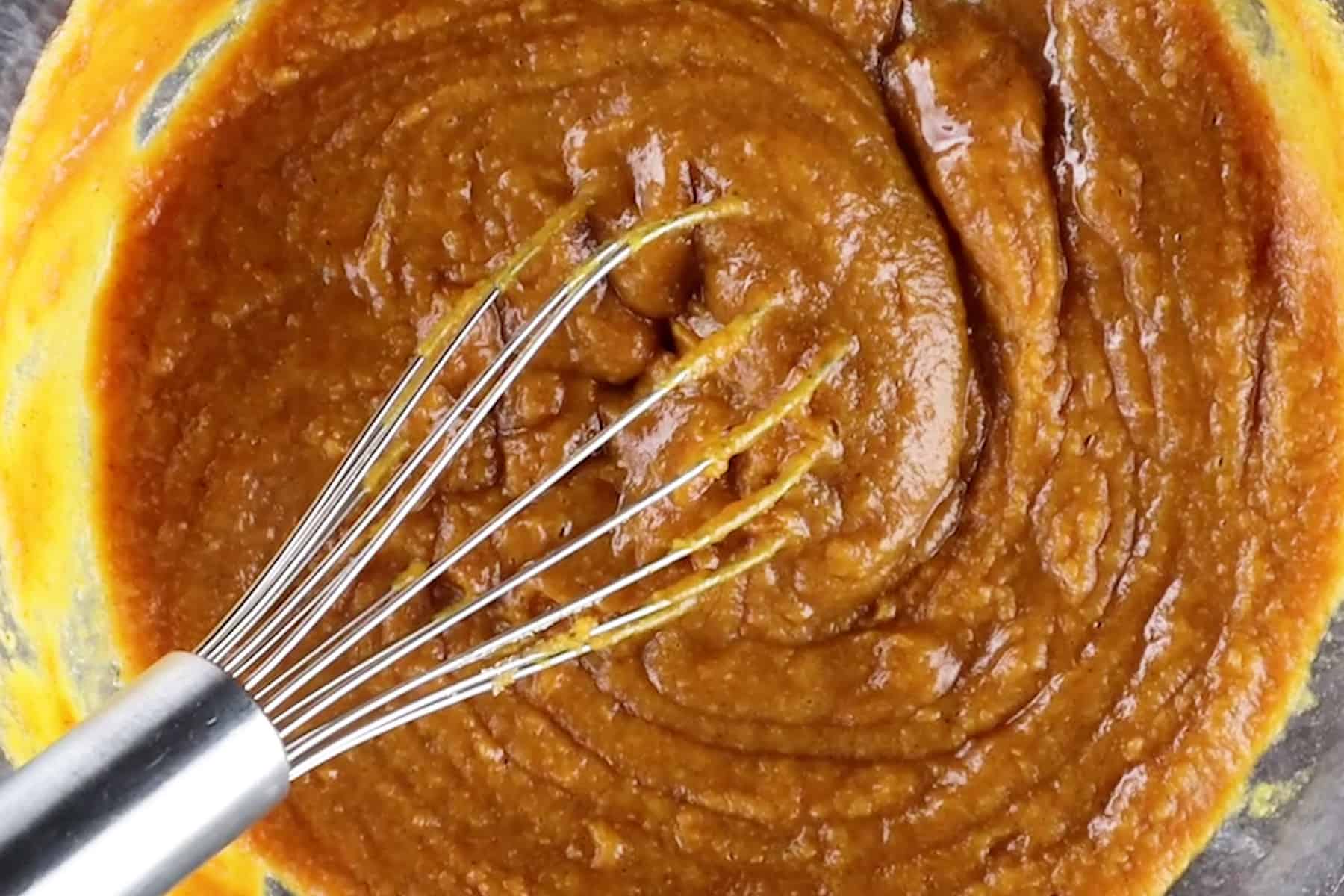 mixing in pumpkin puree