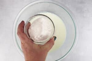 adding white chocolate pudding mix to milk