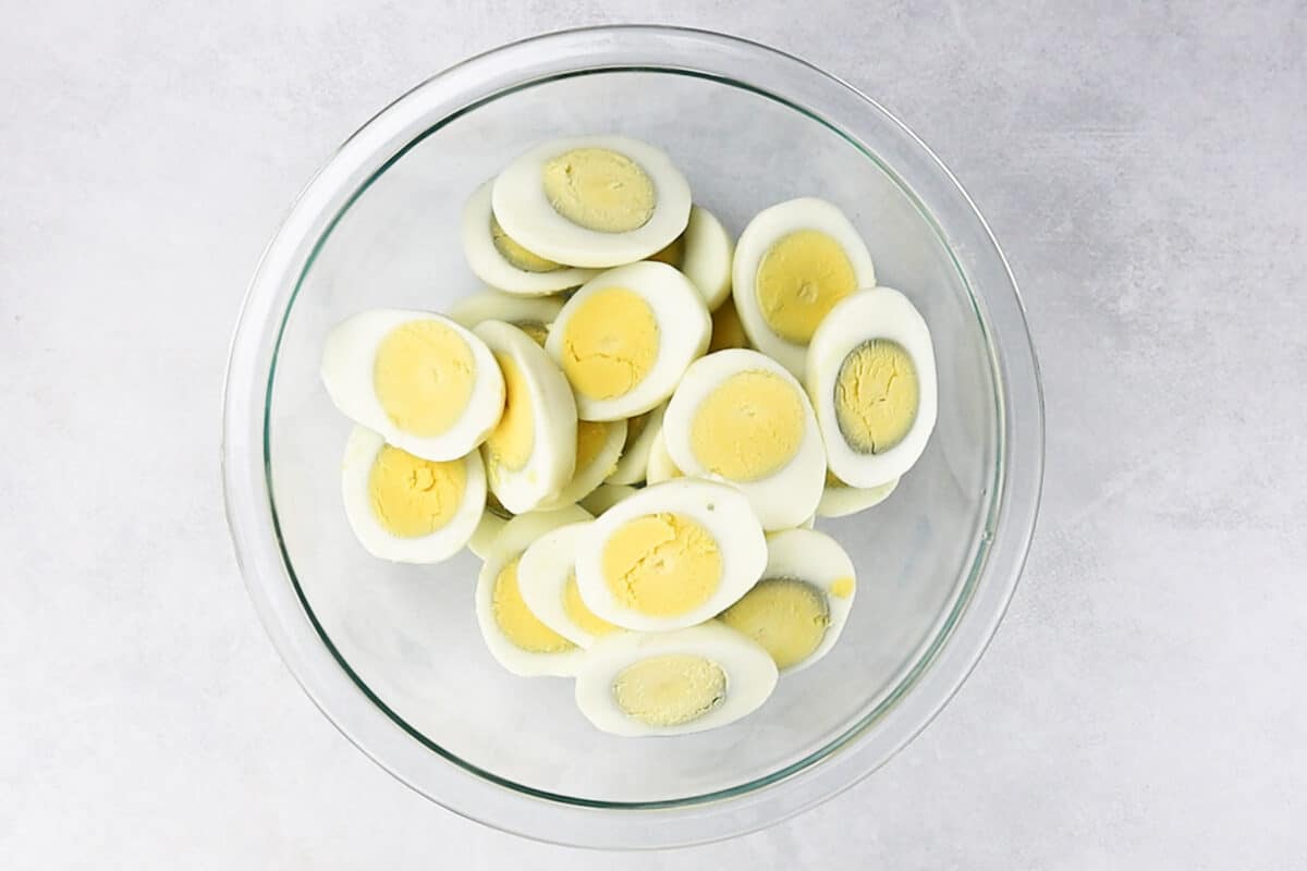 hardboiled eggs cut in half in bowl