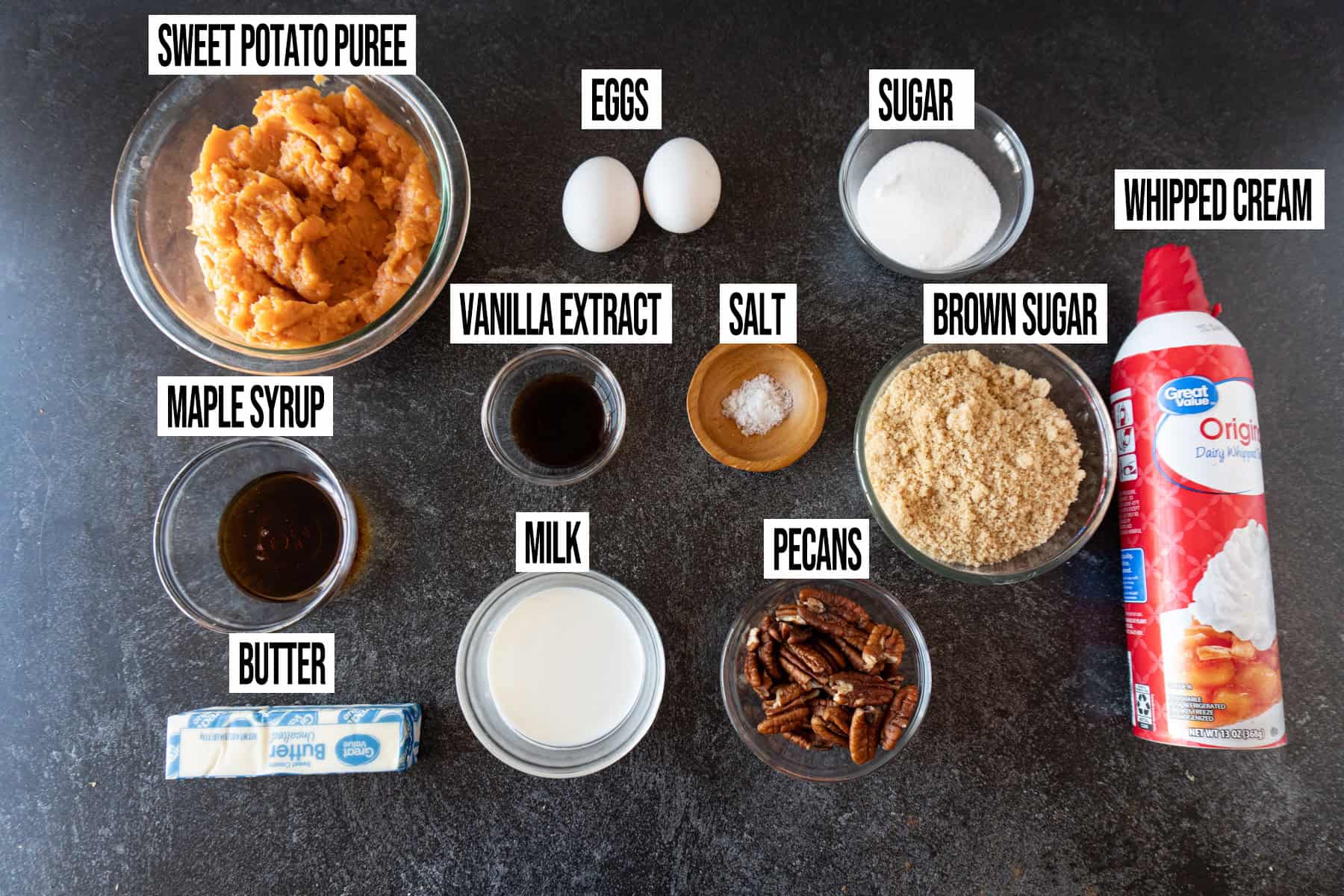 Sweet Potato Pudding Ingredients in individual bowls and labeled.