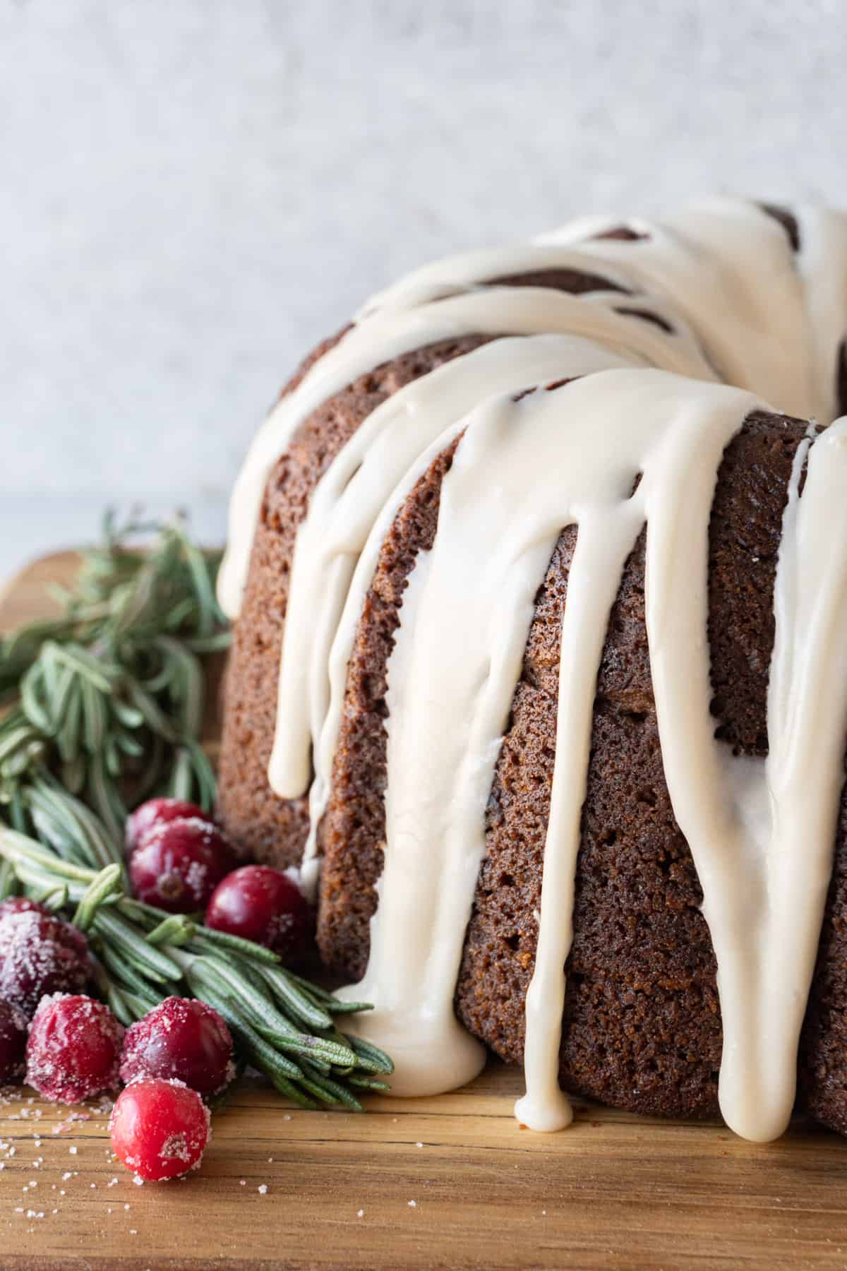 bundt cake with glaze on cutting board