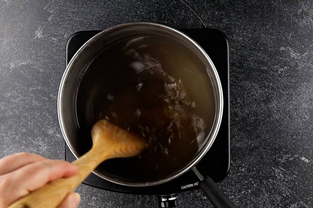 mixing up the brine in pot