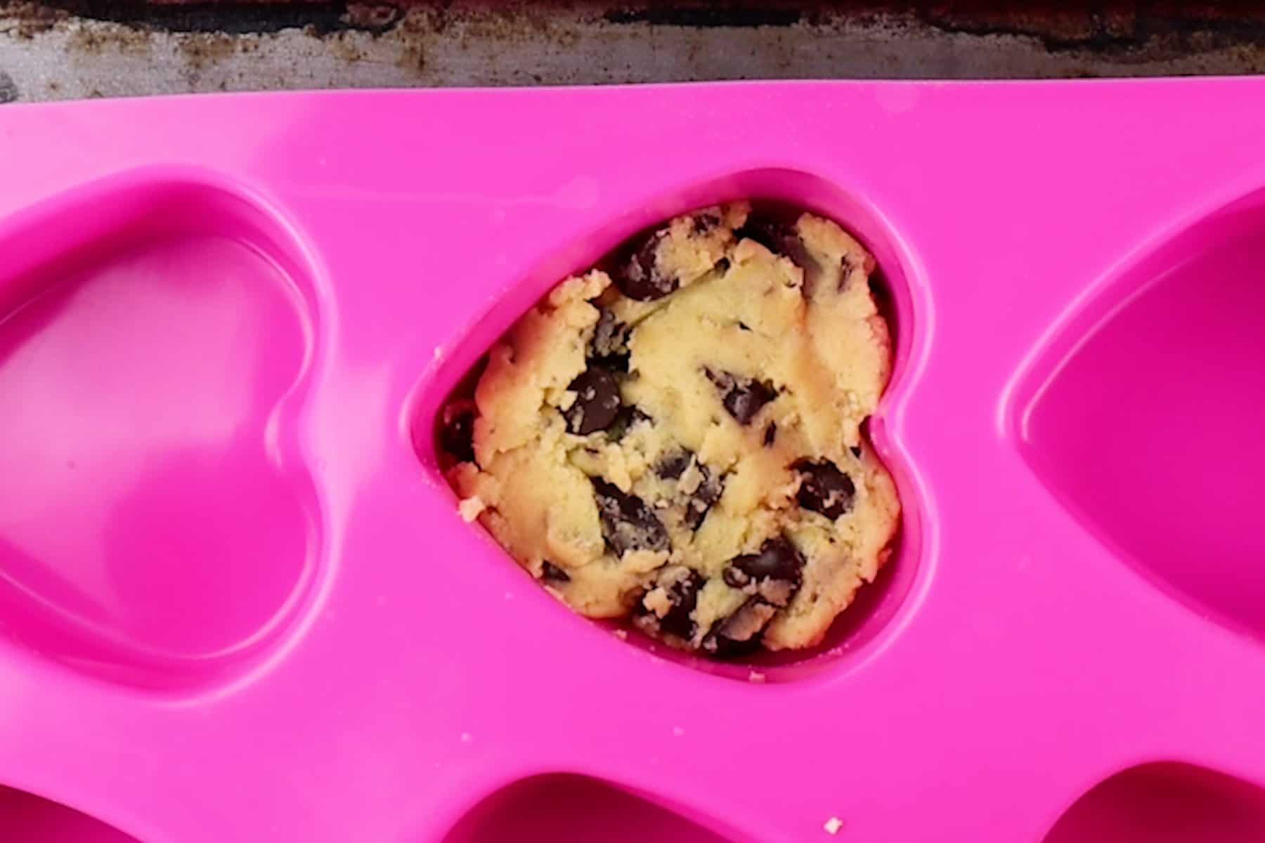 cookie dough pressed in heart mold.