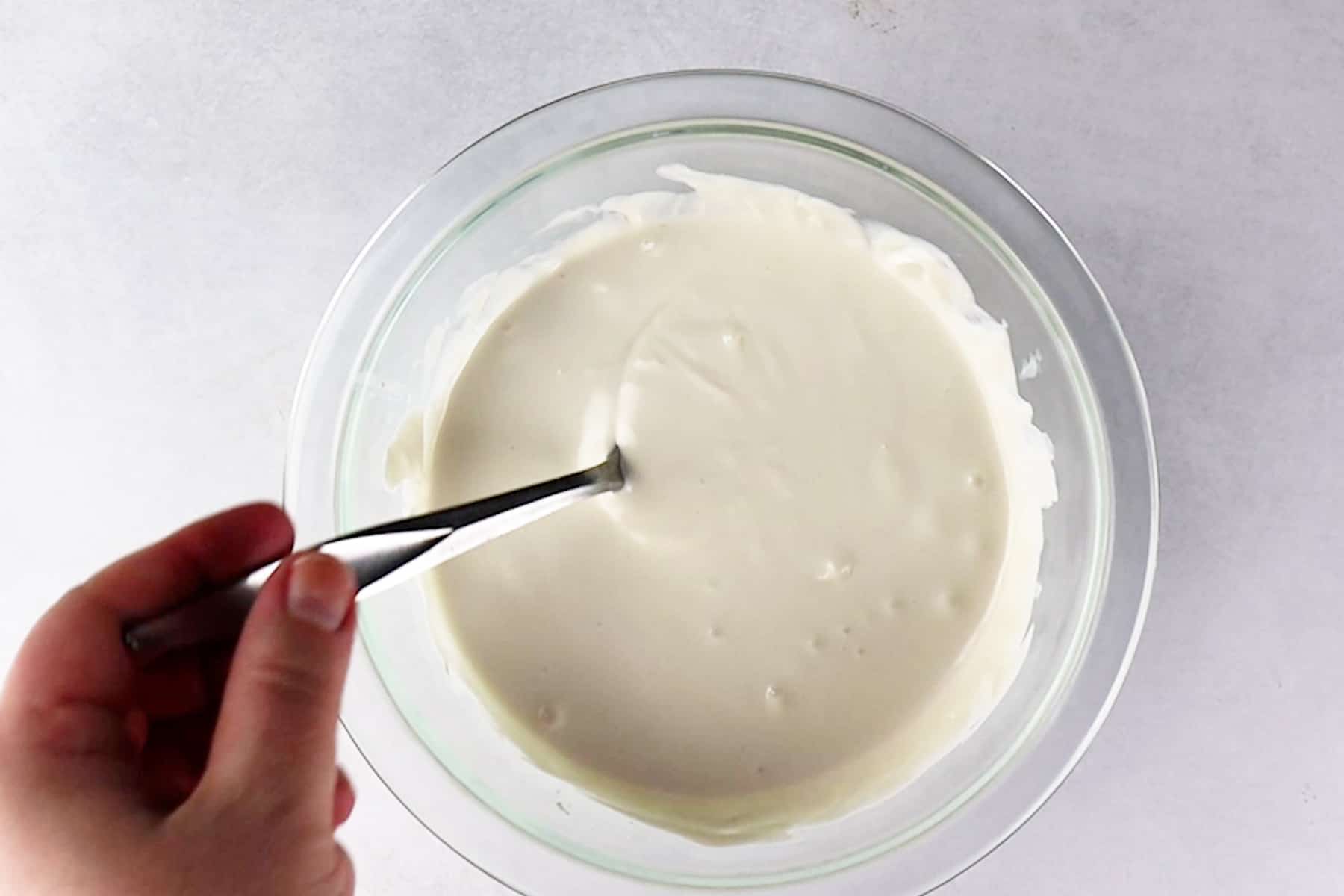 melted white candy melts in bowl