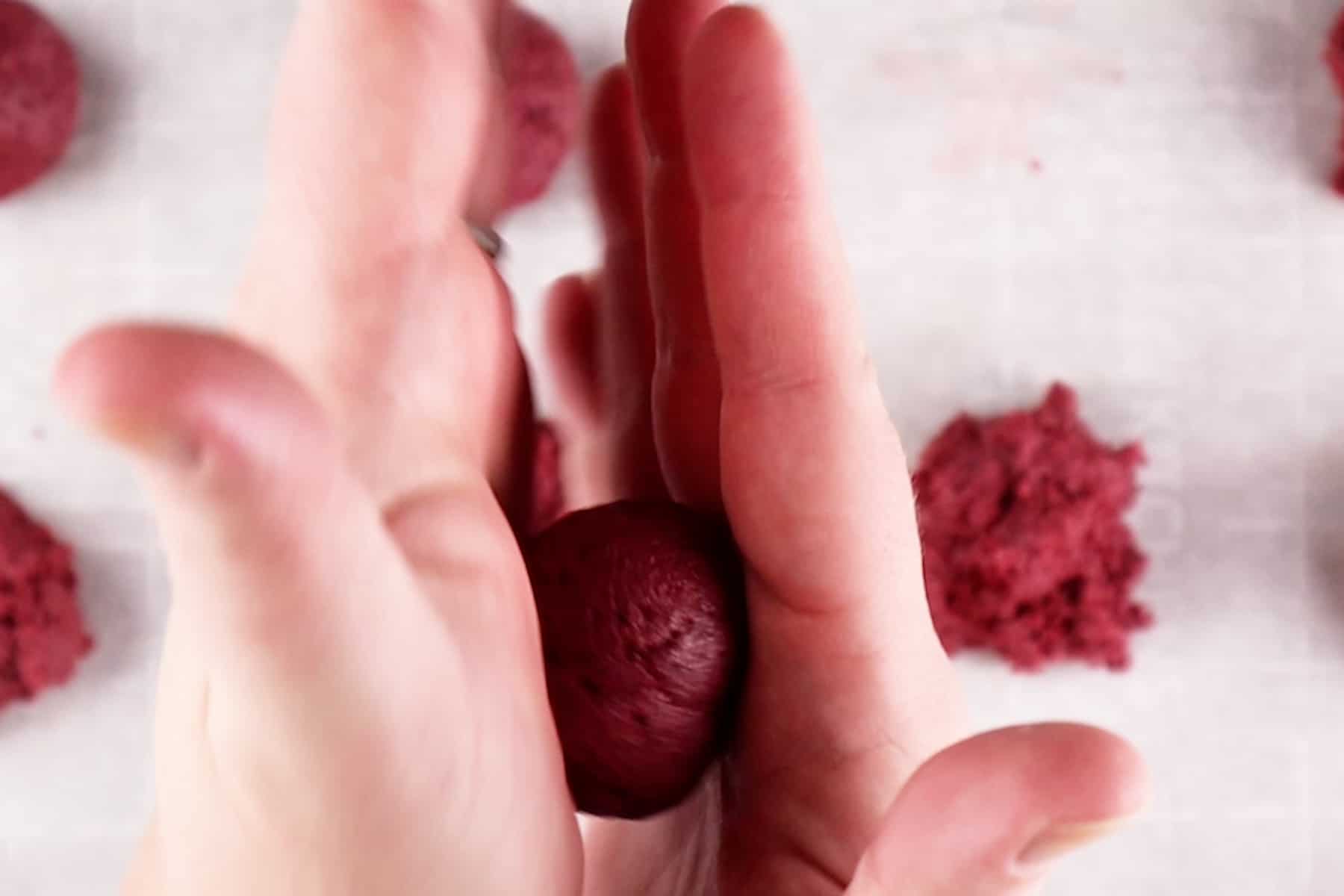 rolling cake balls in-between hands