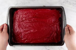 red velvet brownie batter in pan