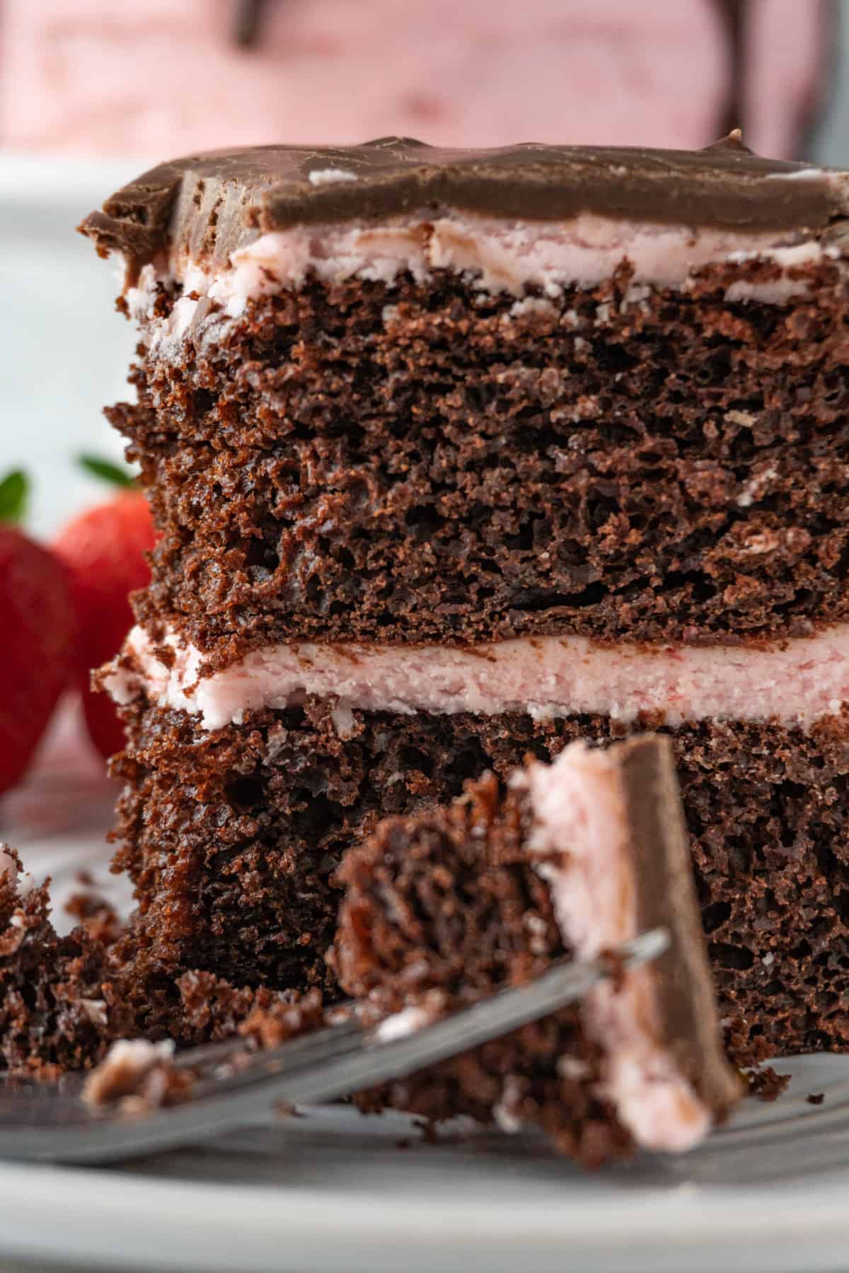 cake on fork next to slice of cake