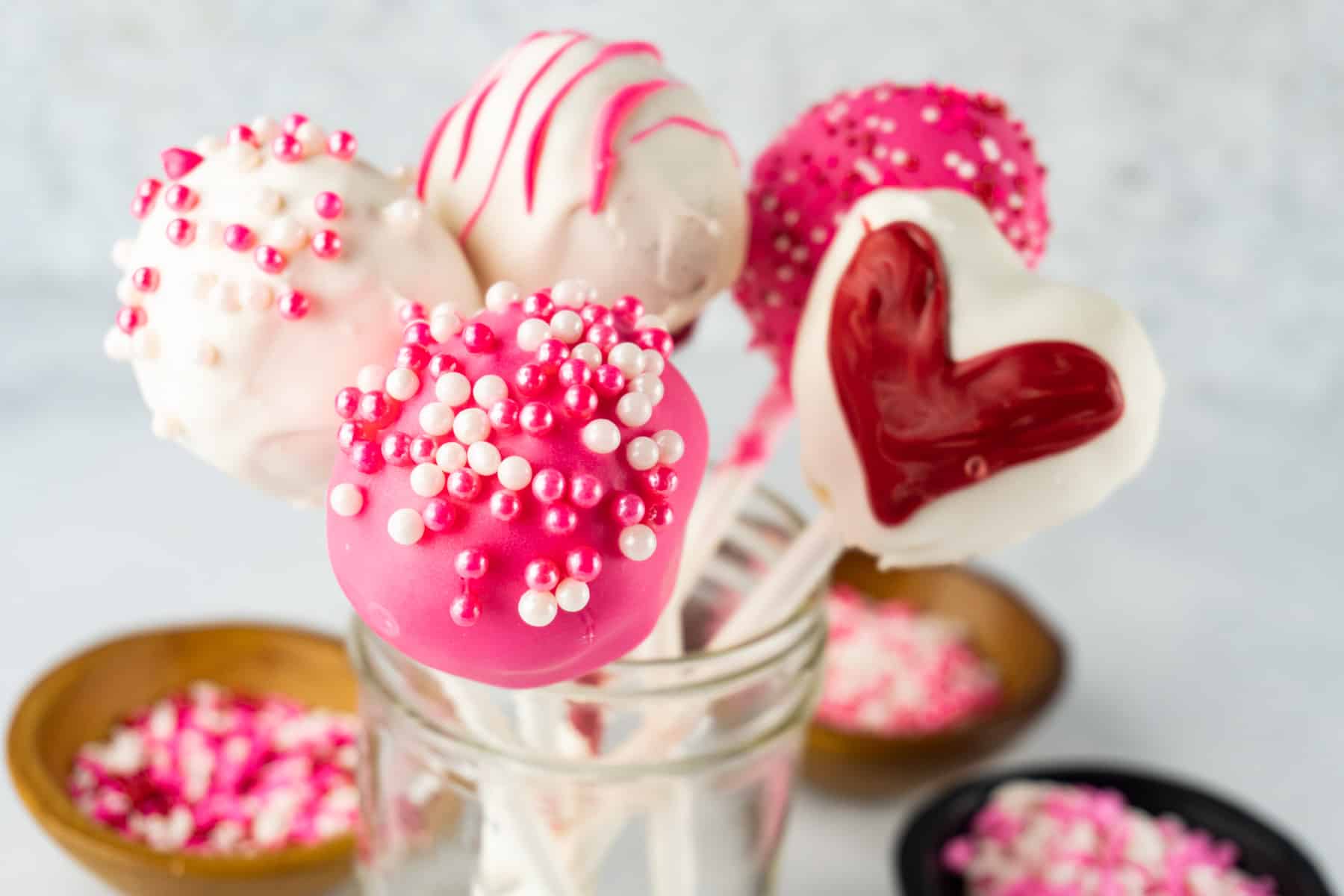 cake pops in mason jar horizontal image