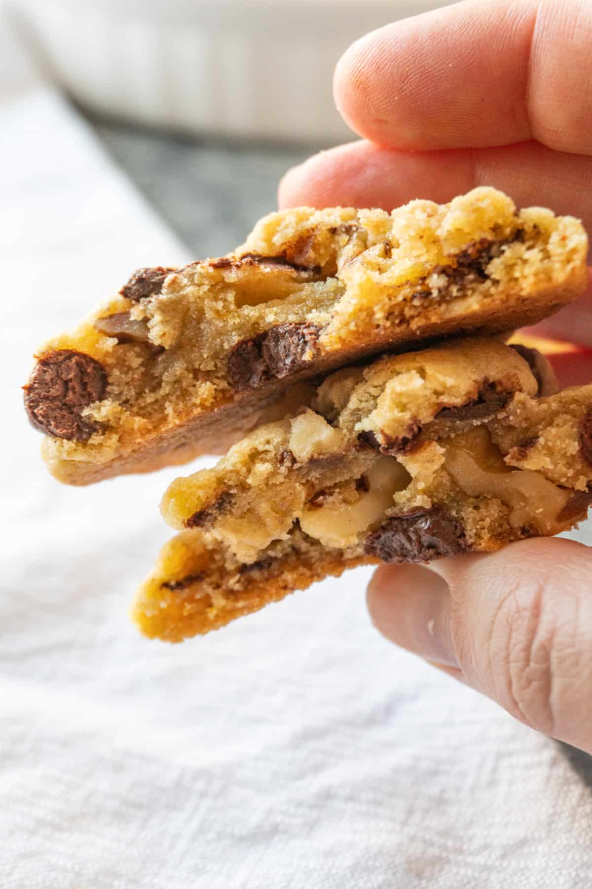 walnut chocolate chip cookie broken in half