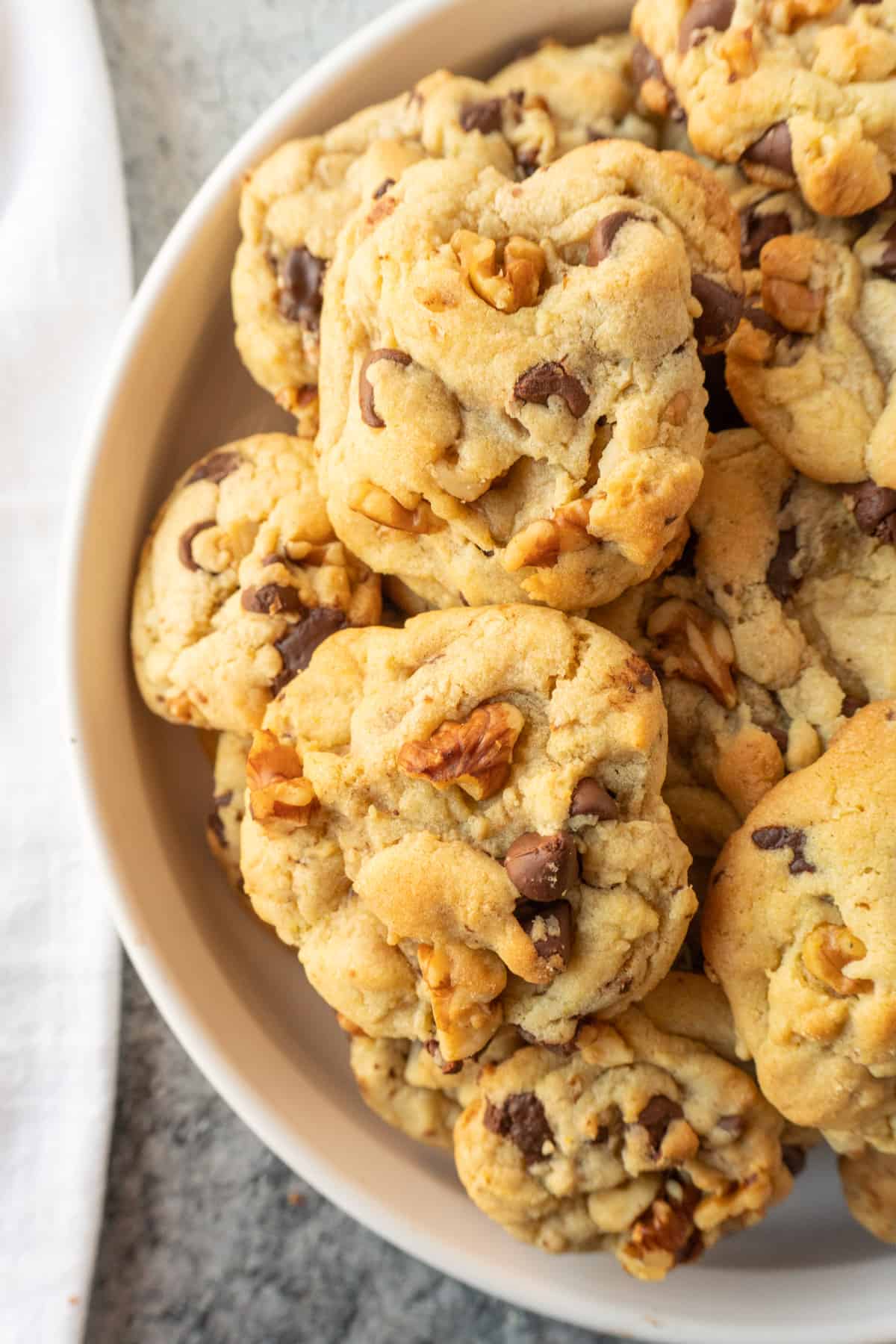 walnut chocolate chip cookies in white dish