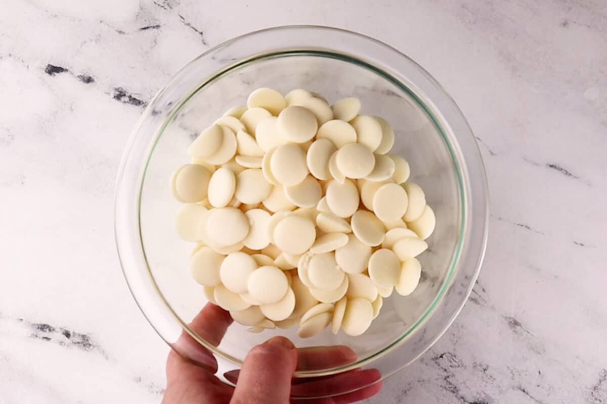 white candy melts in bowl before melting