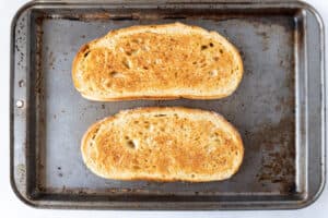 toasted sourdough on baking sheet
