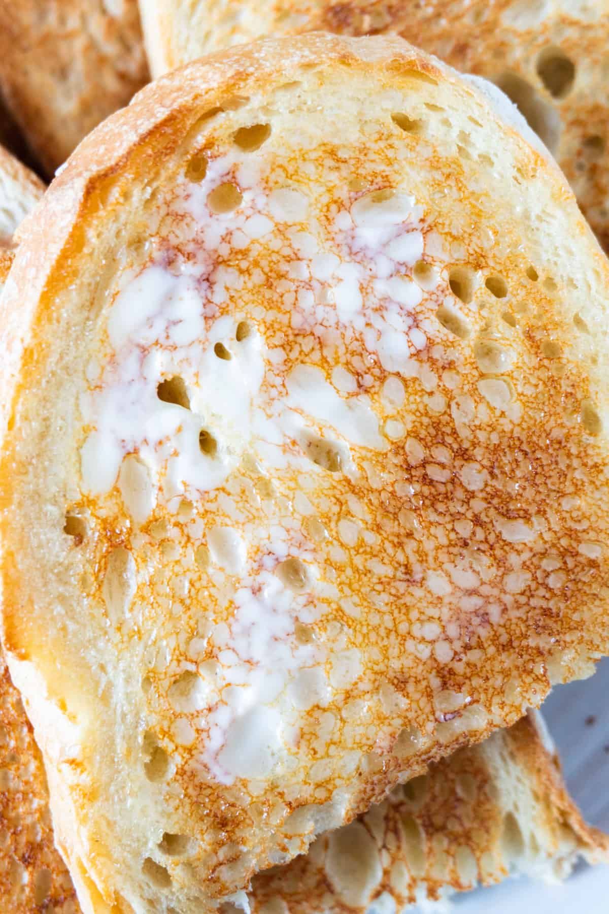 toasted sourdough with butter on melted on it.