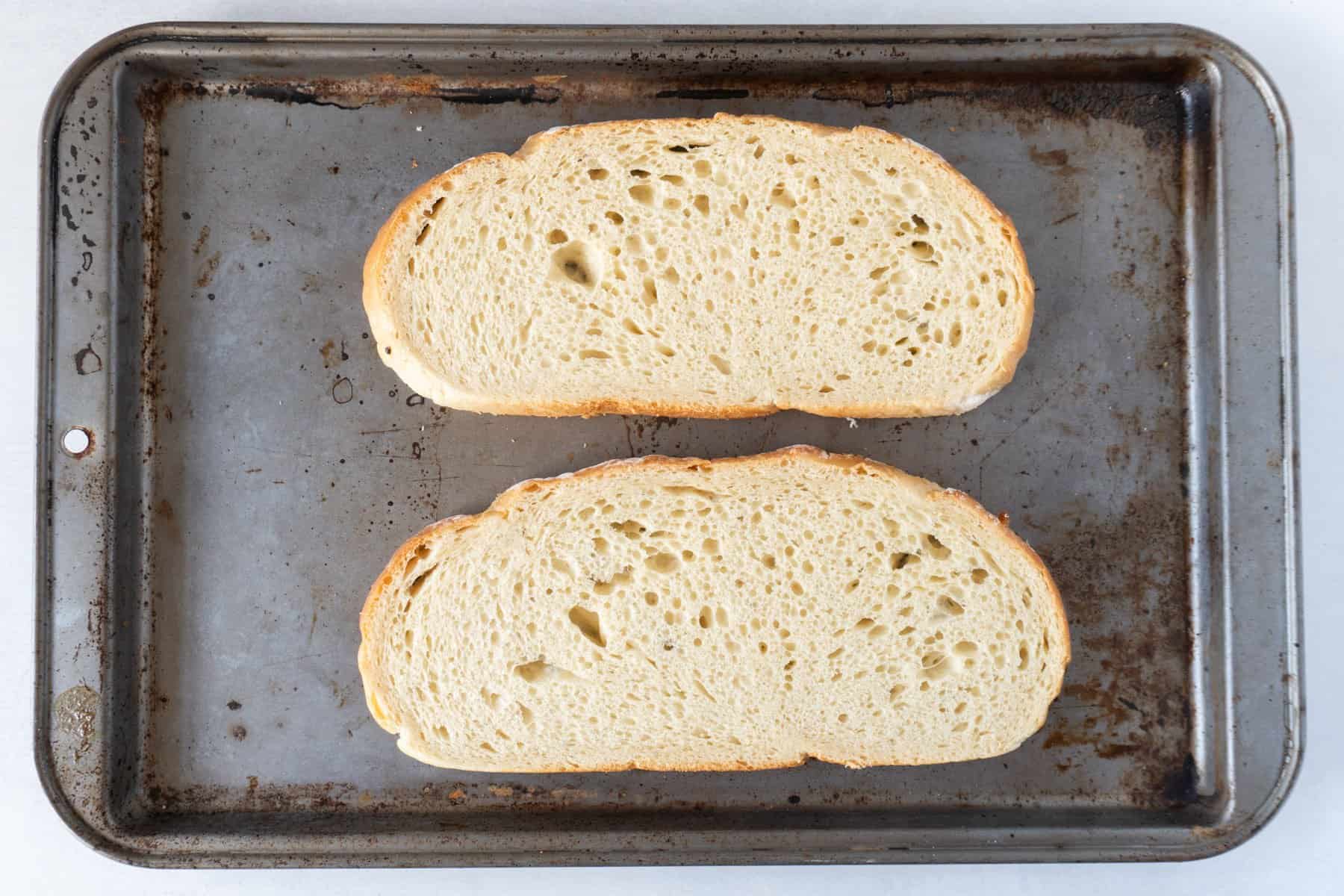 untoasted sourdough on baking sheet