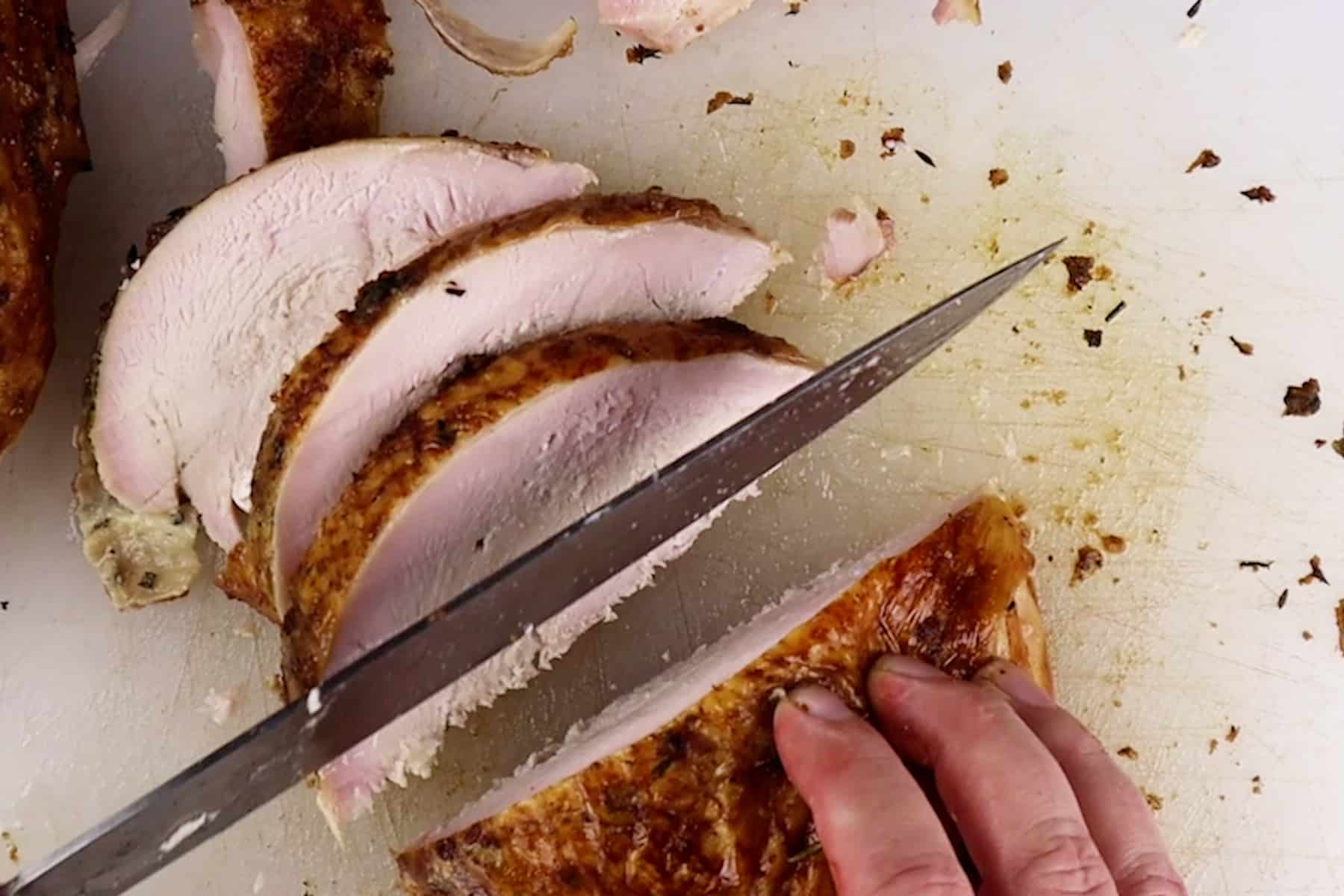 slicing the turkey breast