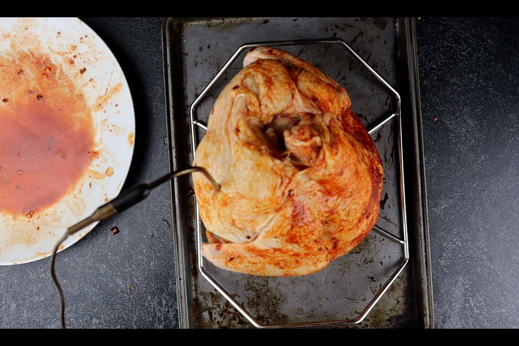 adding thermometer to chicken