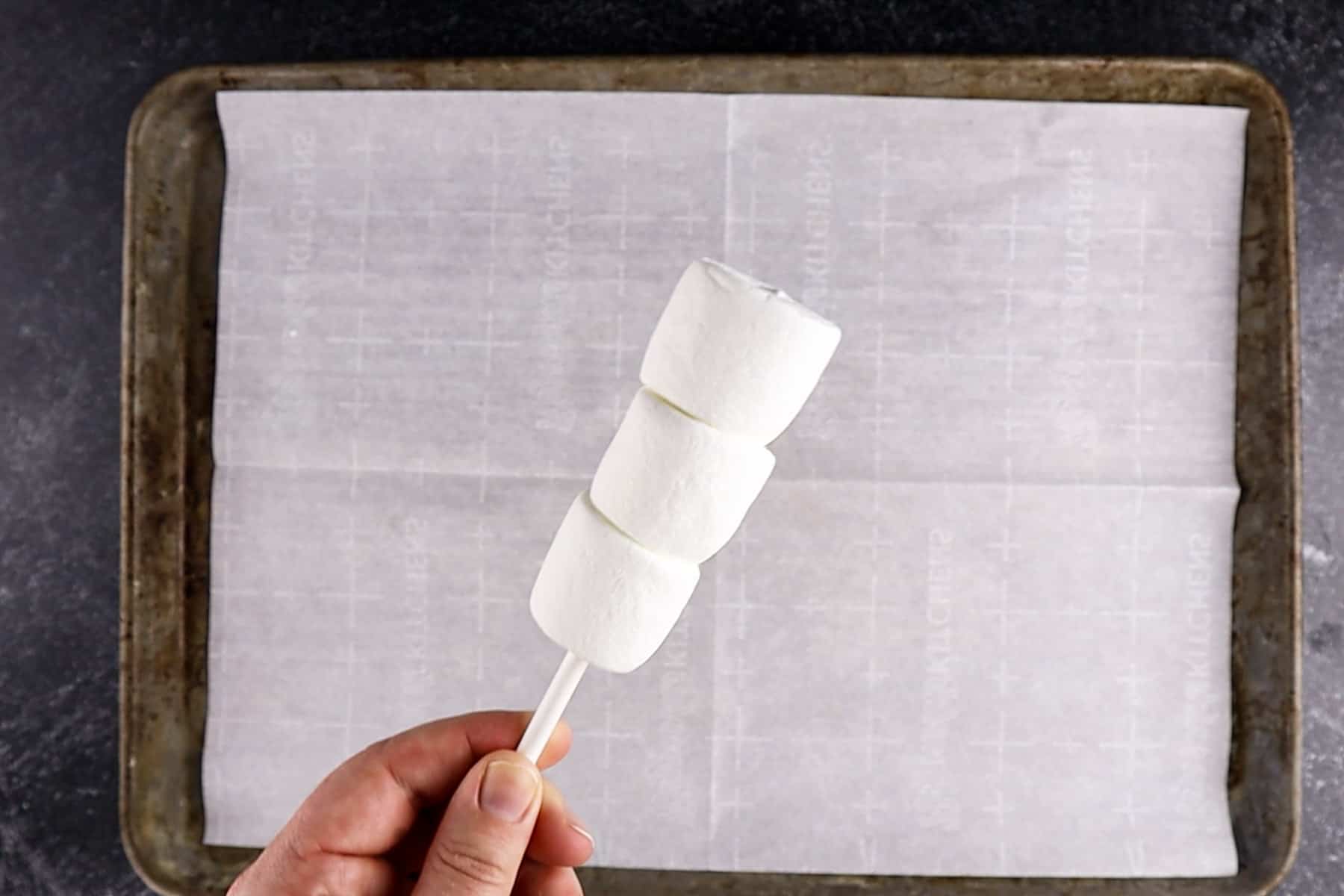 marshmallows on a cake pop stick