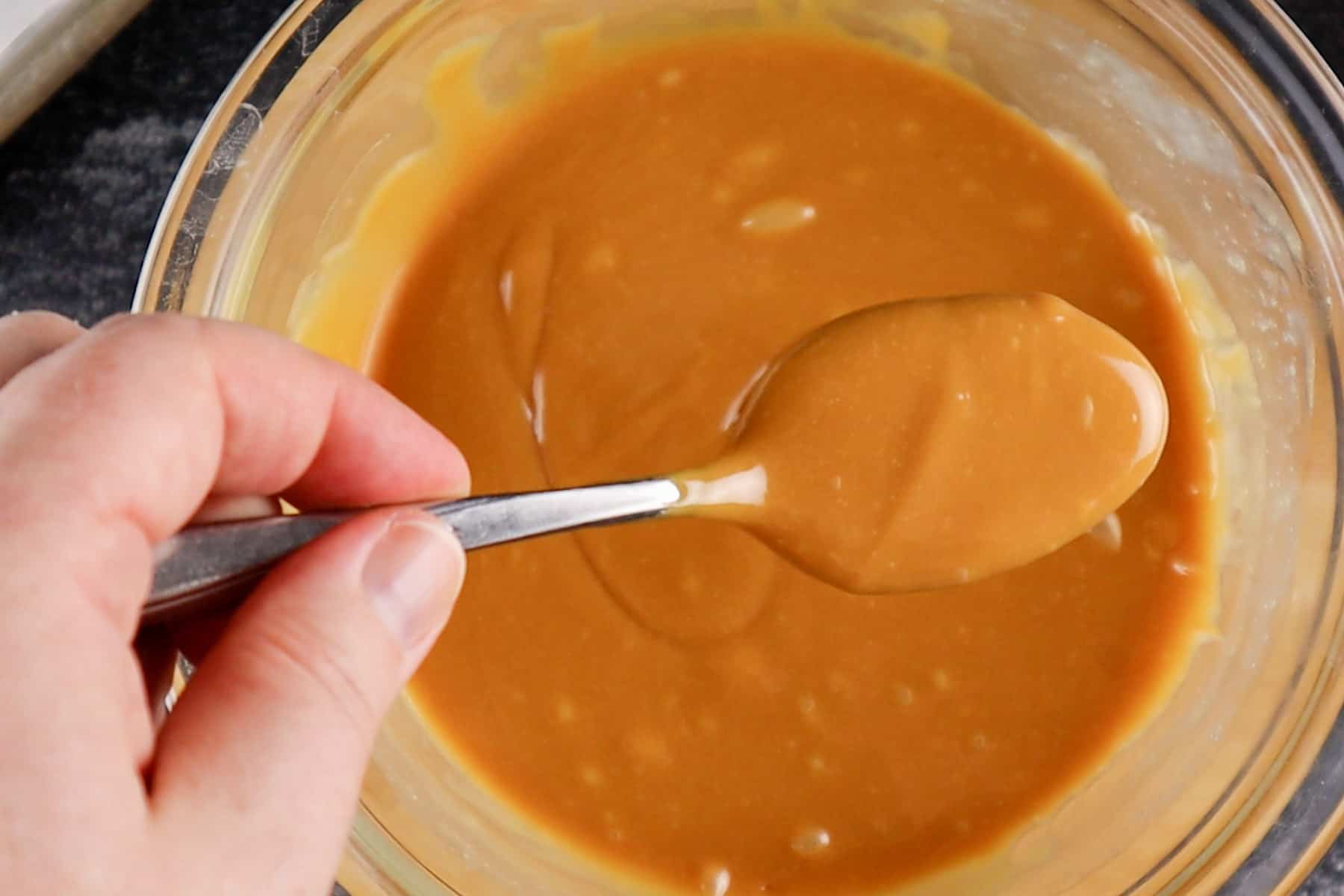 melted caramel and cream in bowl