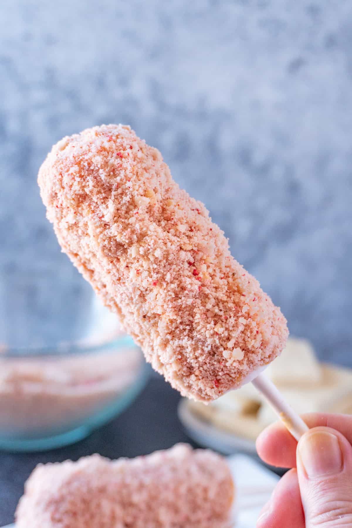 Strawberry Shortcake Marshmallow Wand held in hand