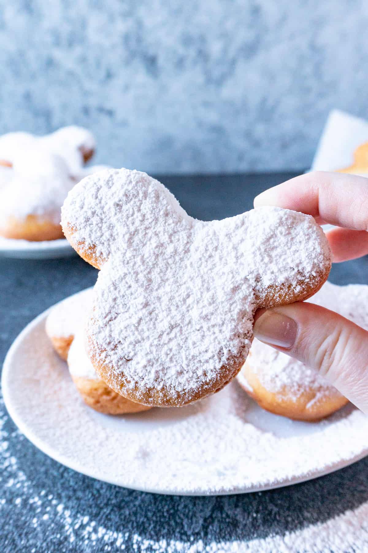 disneyland beignets recipe being held