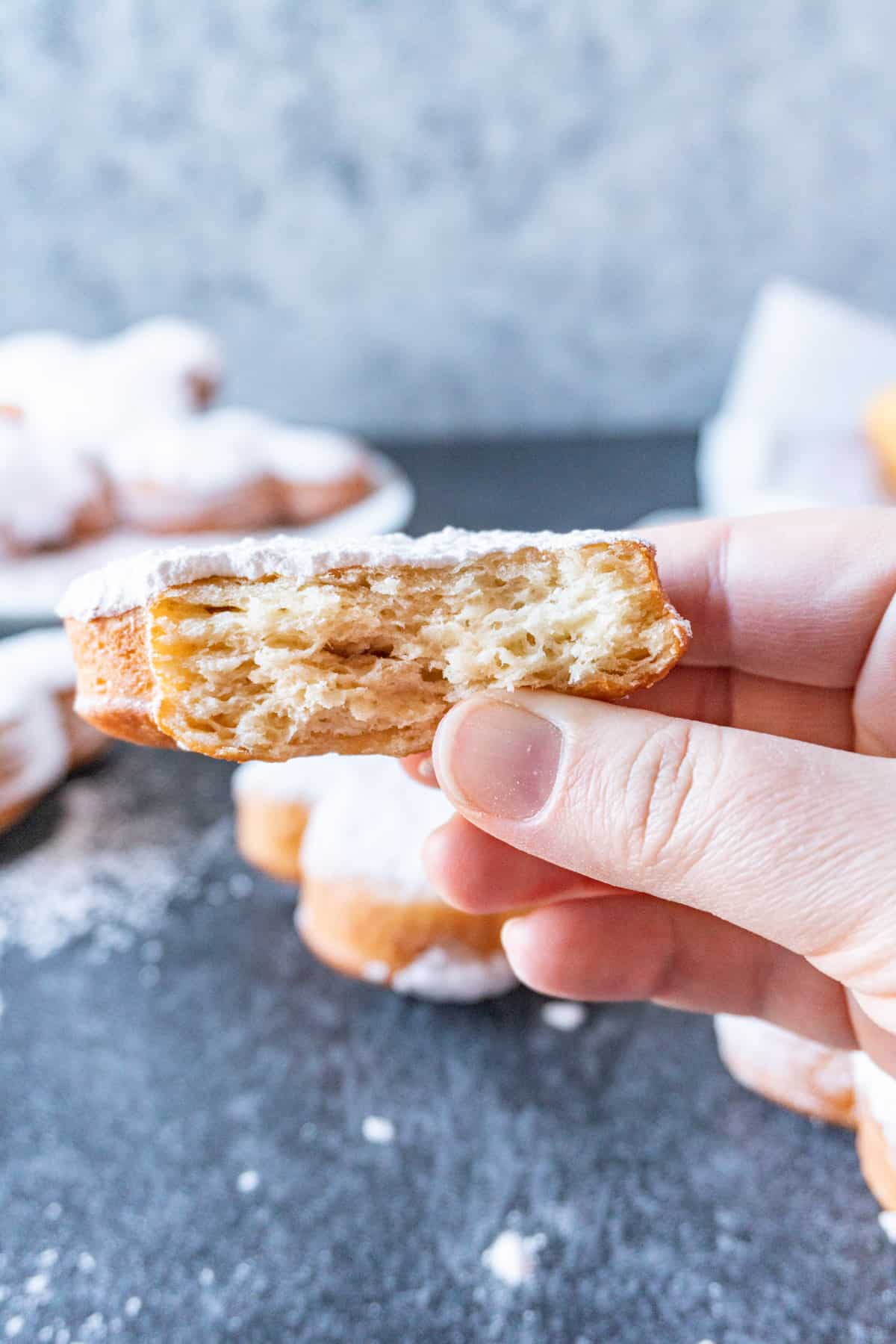 showing a bite taken out of beignet