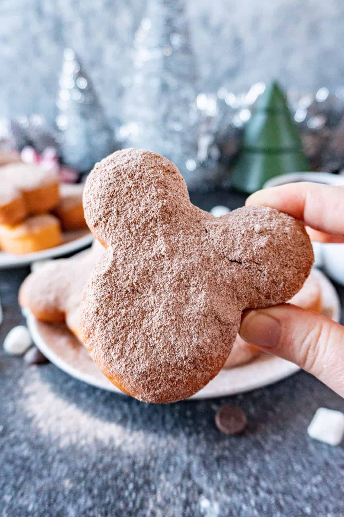 hot cocoa beignet being held