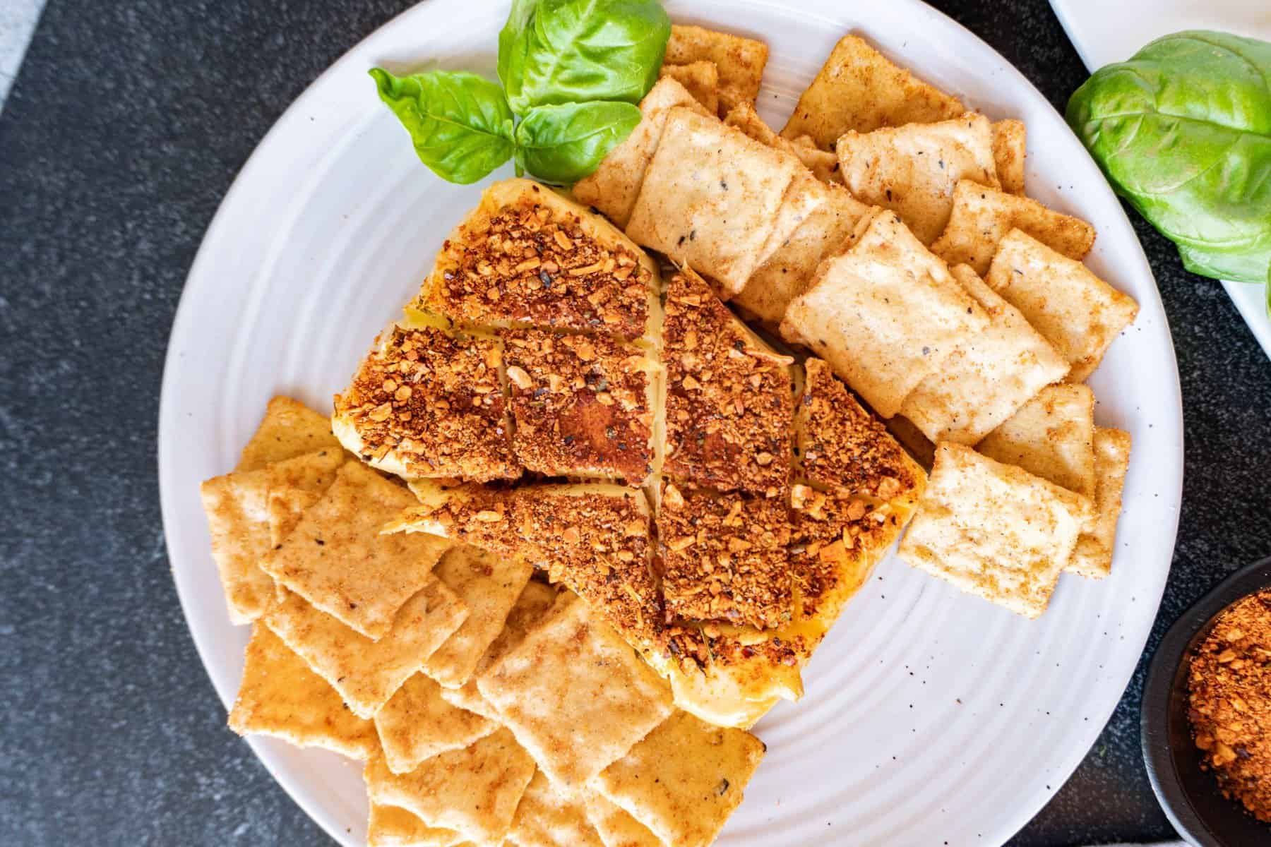 Smoked Cream Cheese on plate with crackers and basil