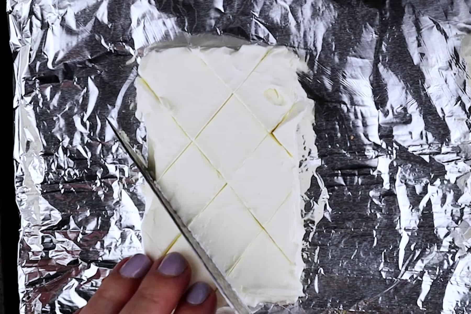 scoring cream cheese