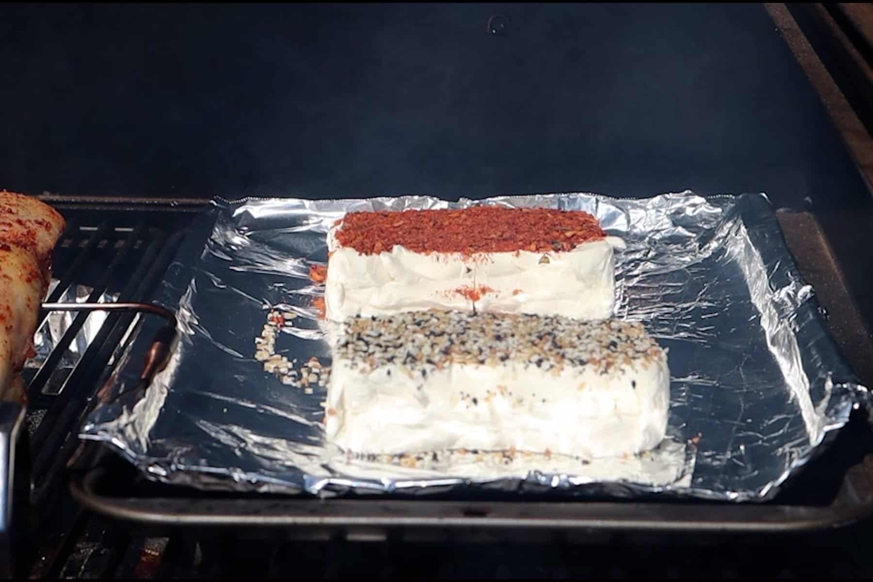 cream cheese being added to smoker