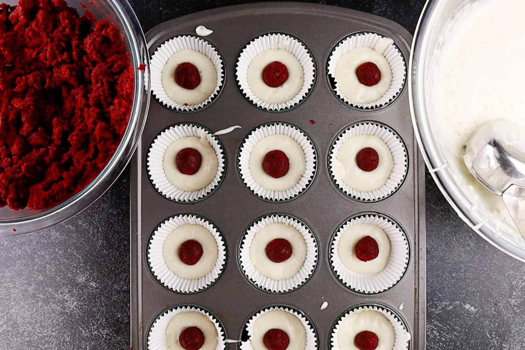 red velvet balls in cupcake batter
