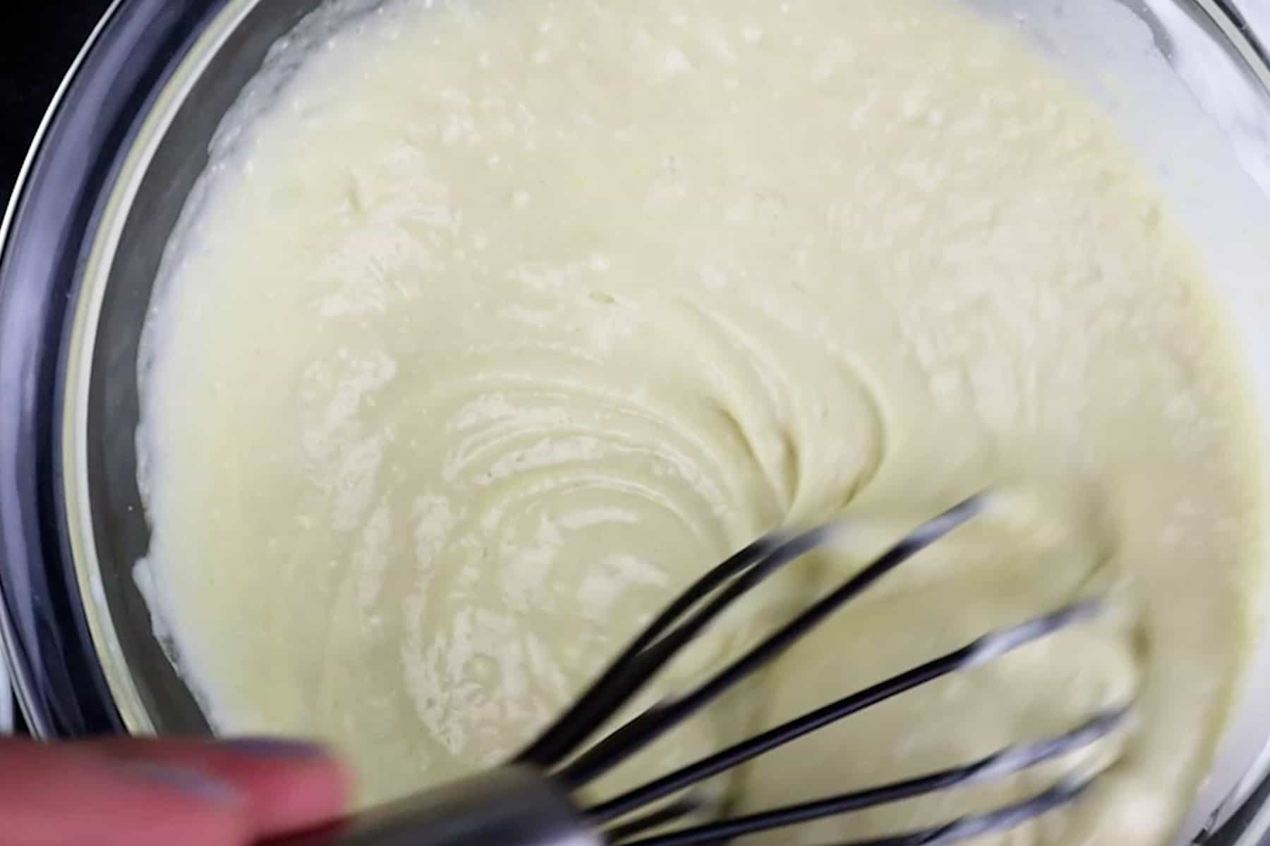 mixing together pancake batter.