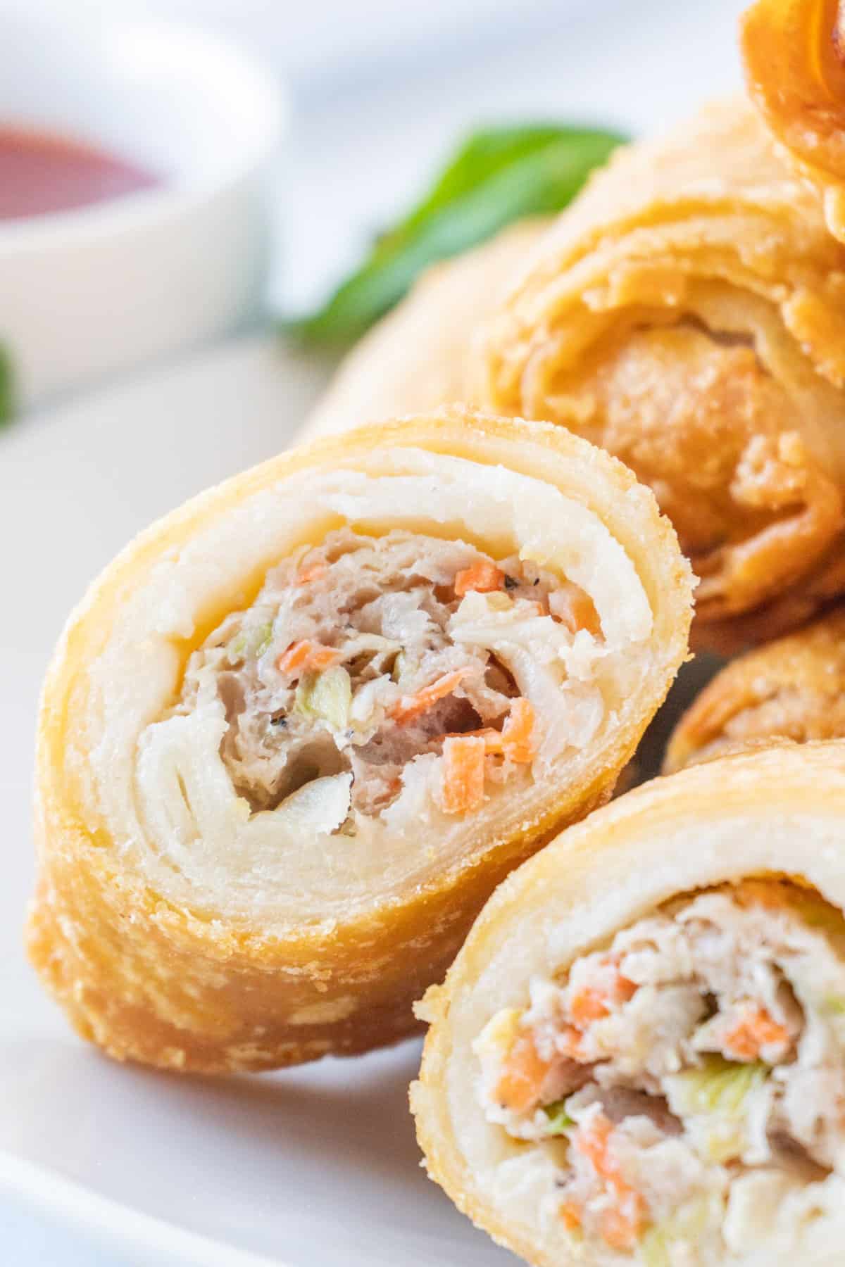 close up of egg roll cut in half.