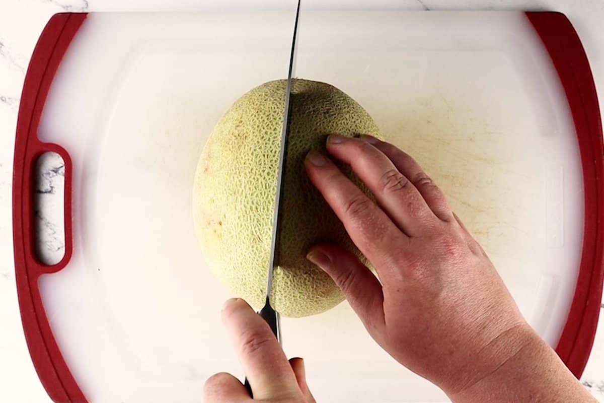 cutting cantaloupe in half
