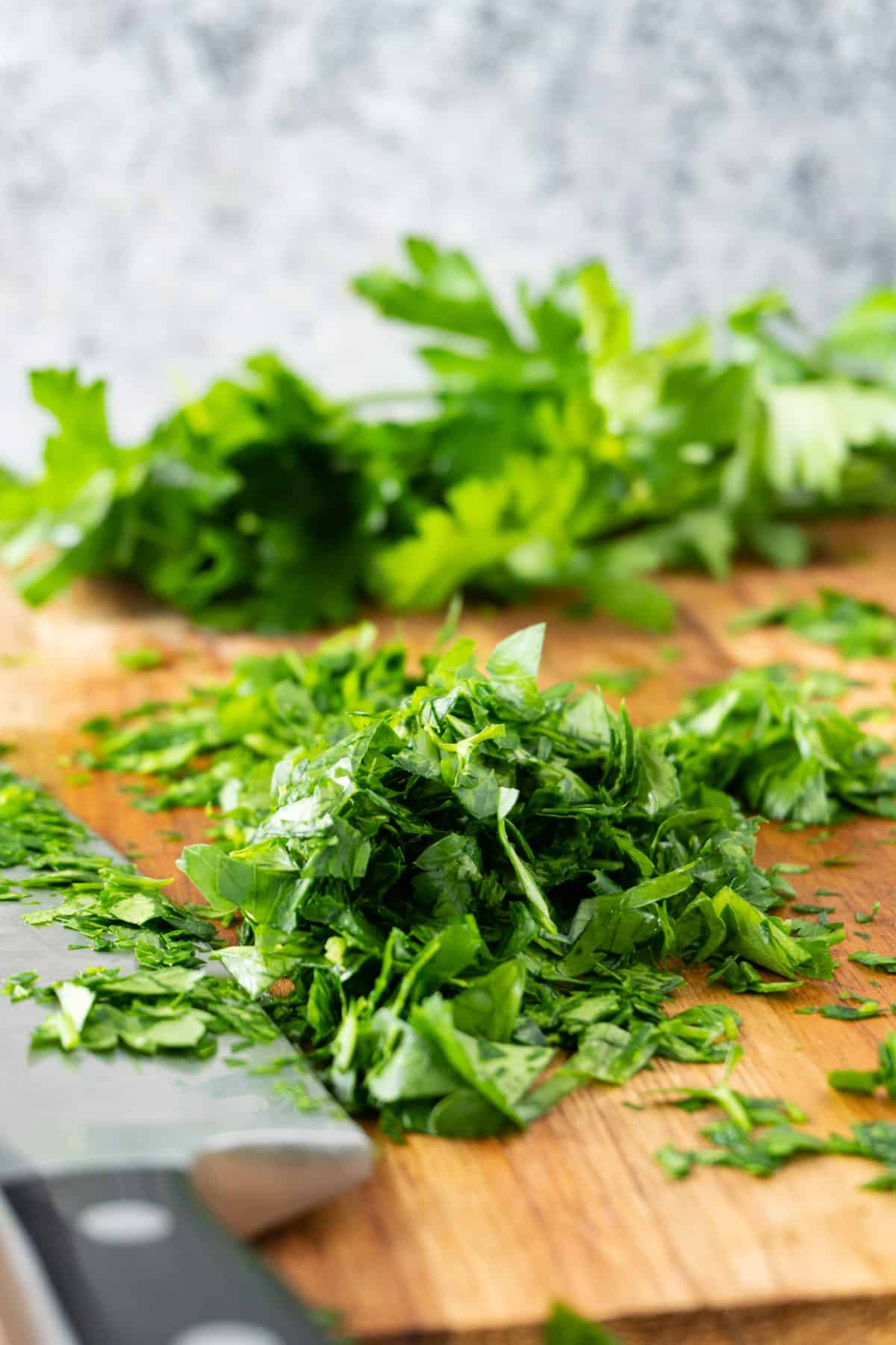 chopped parsley on cutting board.