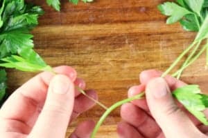 removing stems from parsley