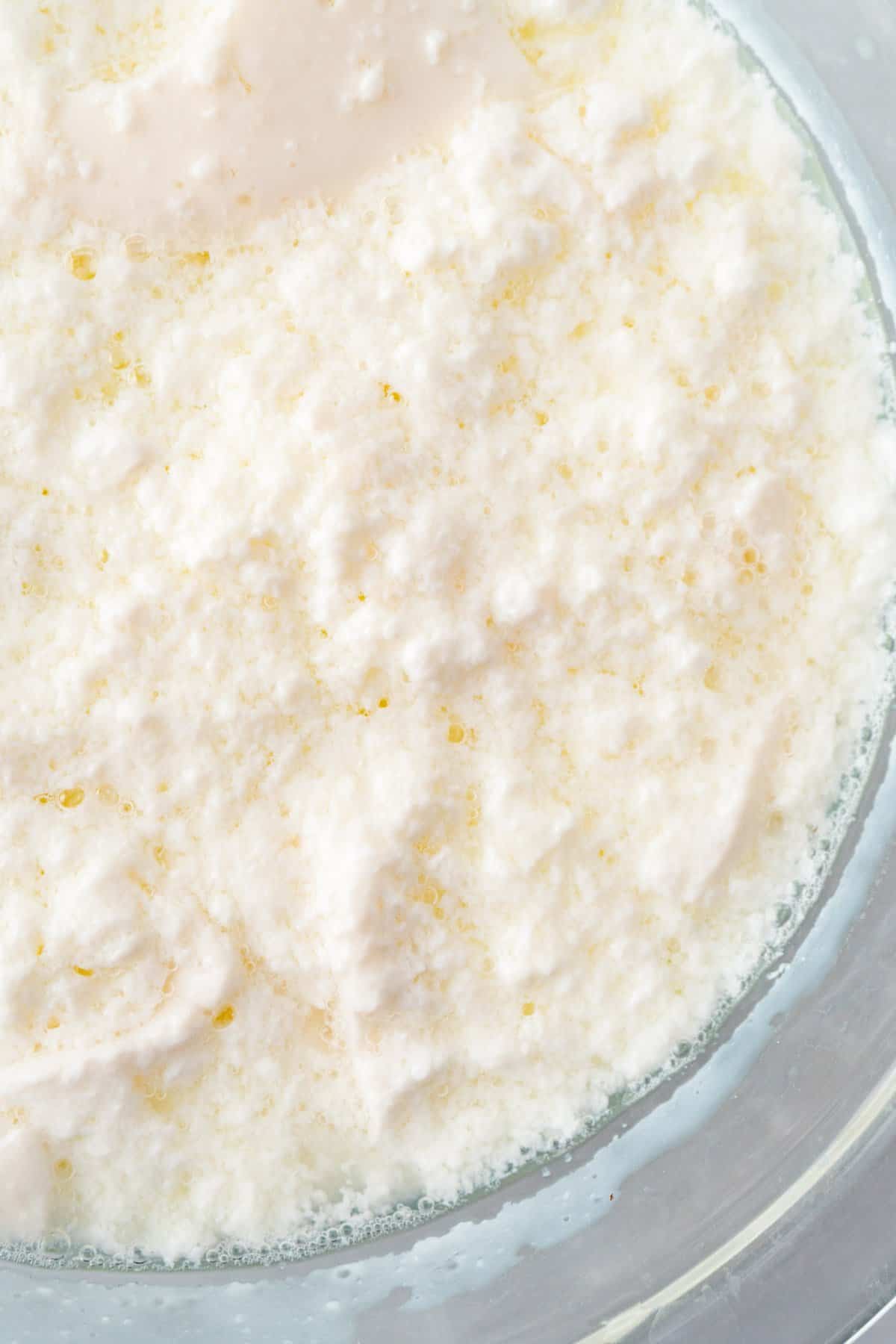 close up of bad curdled buttermilk