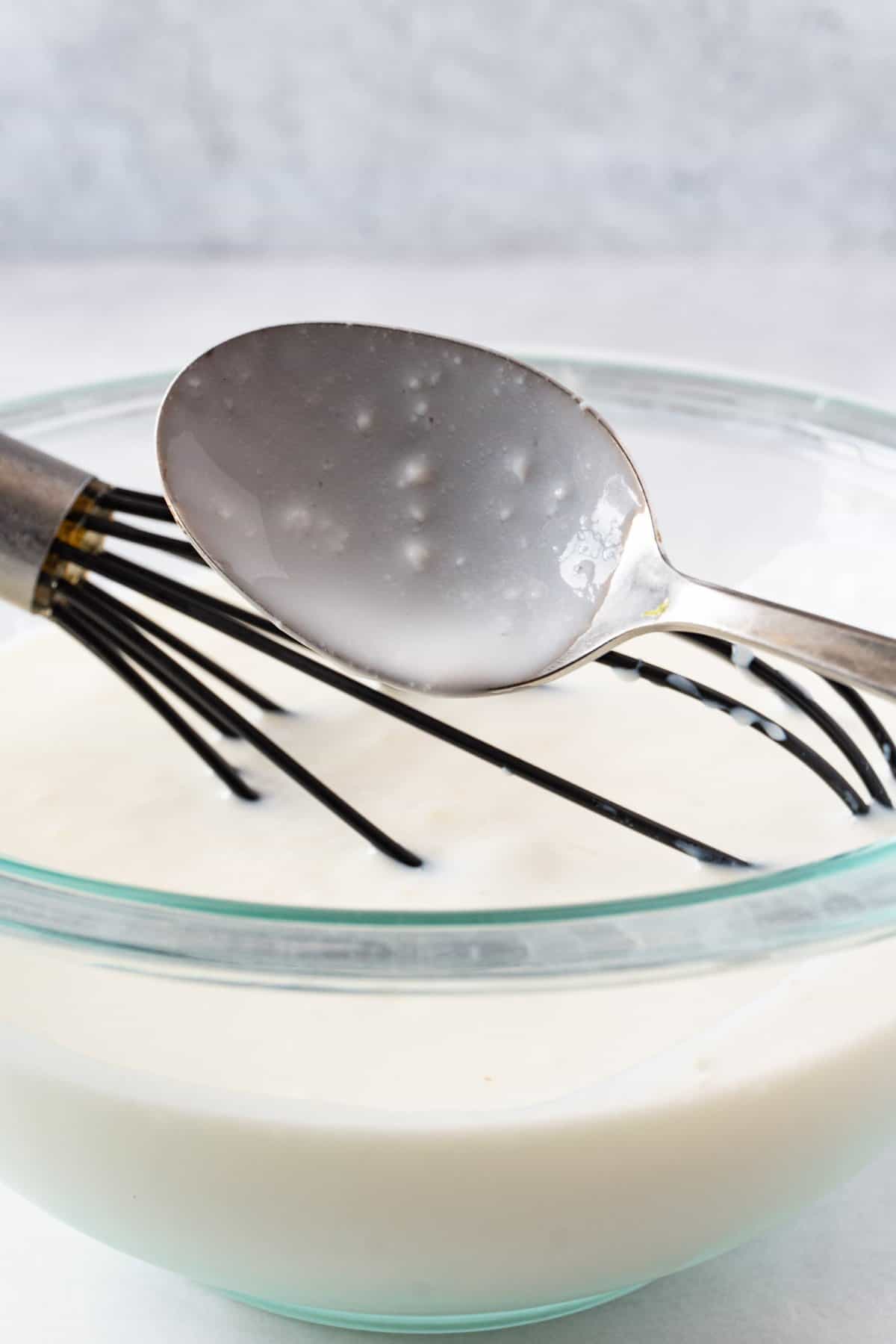 good buttermilk on spoon showing a few little lumps