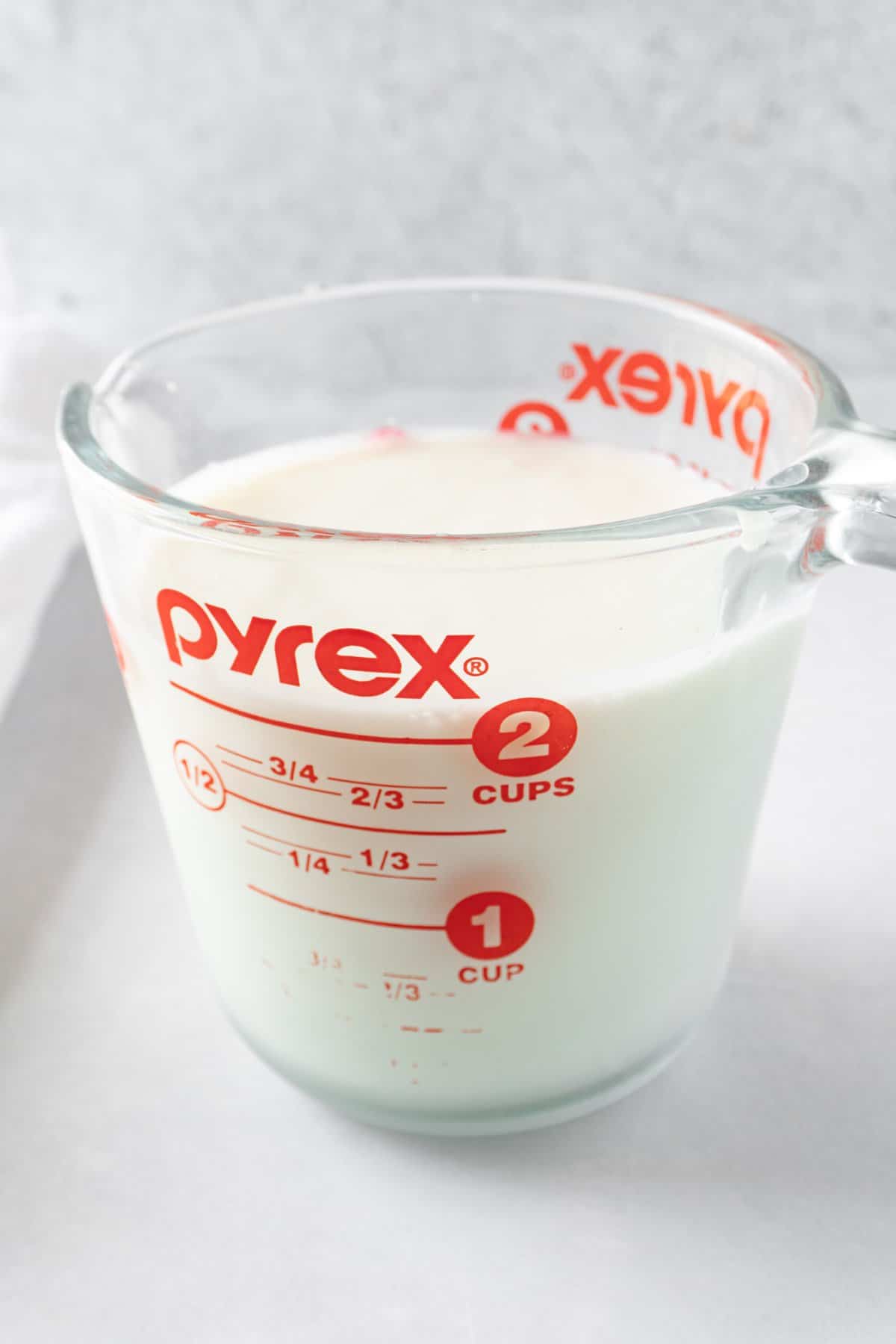 goof buttermilk in a pyrex measuring cup