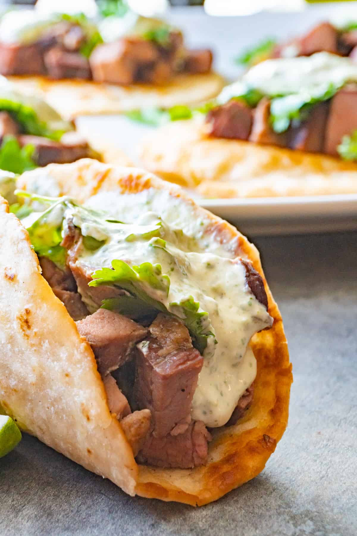 tri tip taco with cilantro lime sauce.