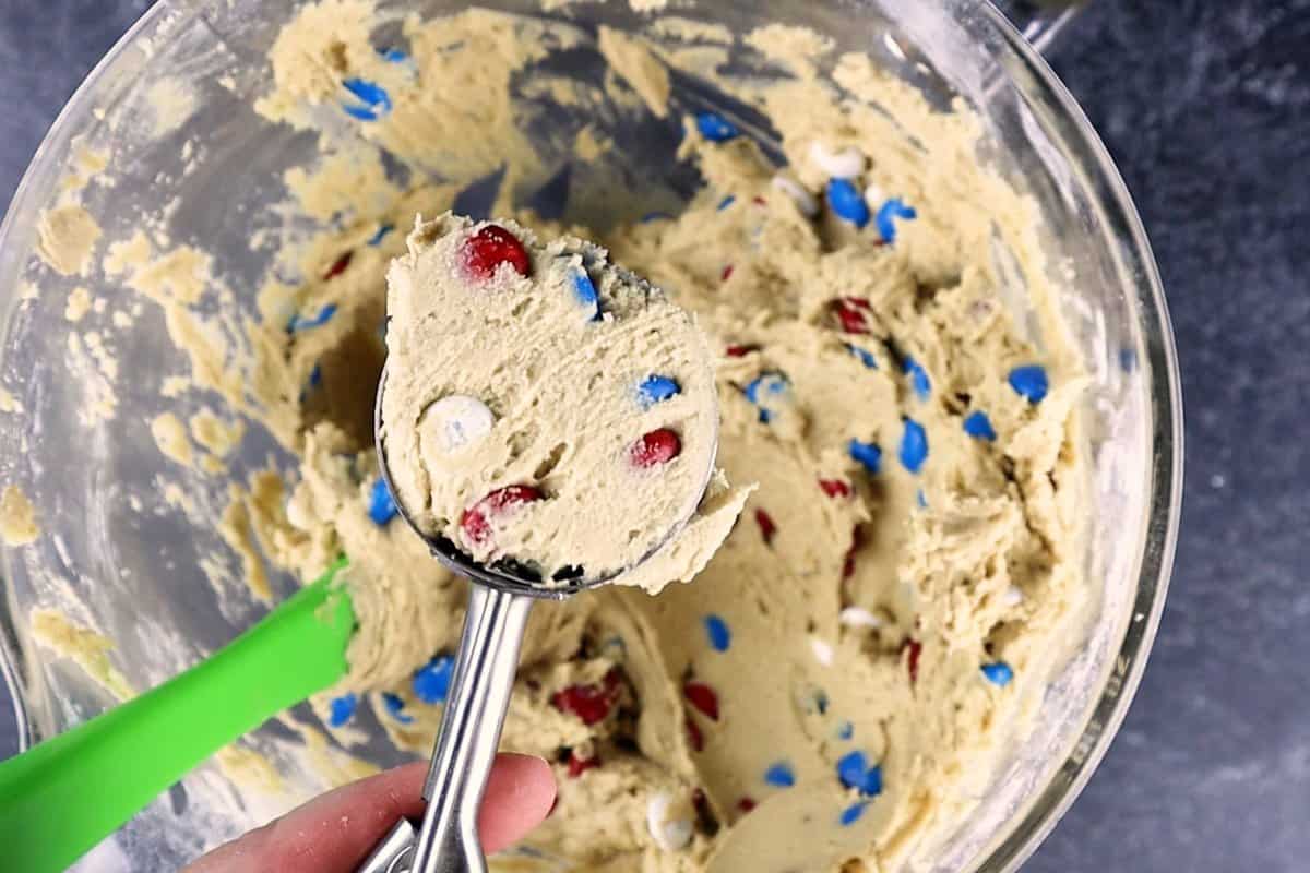 scooping batter in cookie scoop
