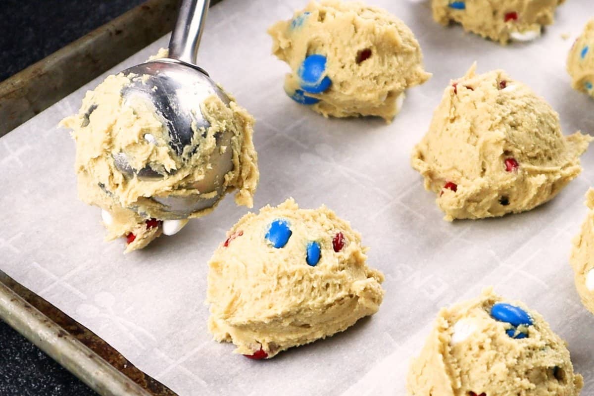 placing scooped dough baking sheet