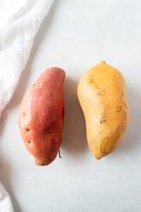 two different colored fresh sweet potatoes