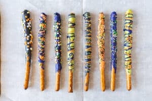 decorated Halloween Pretzel Rods in a line
